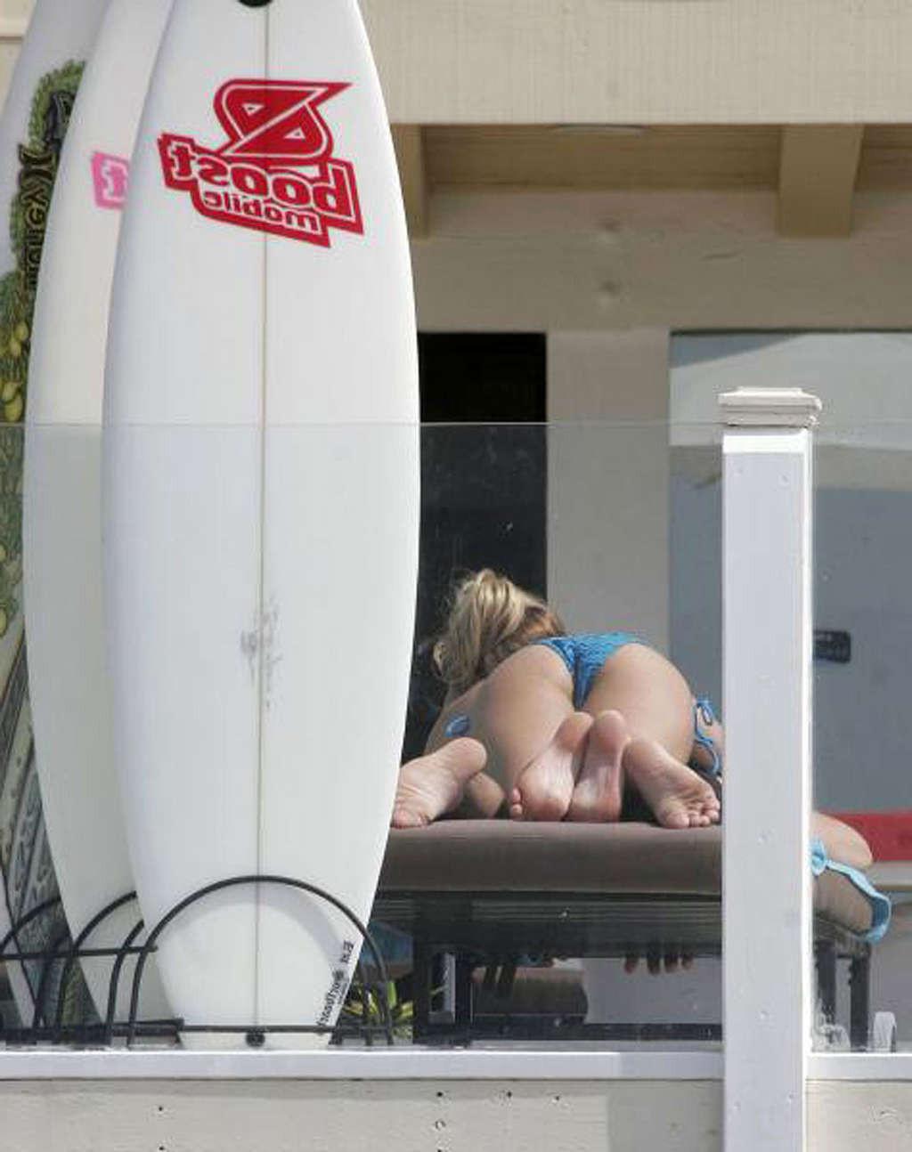 16P Kristin Cavallari exposing her sexy body and hot ass in bikini on pool