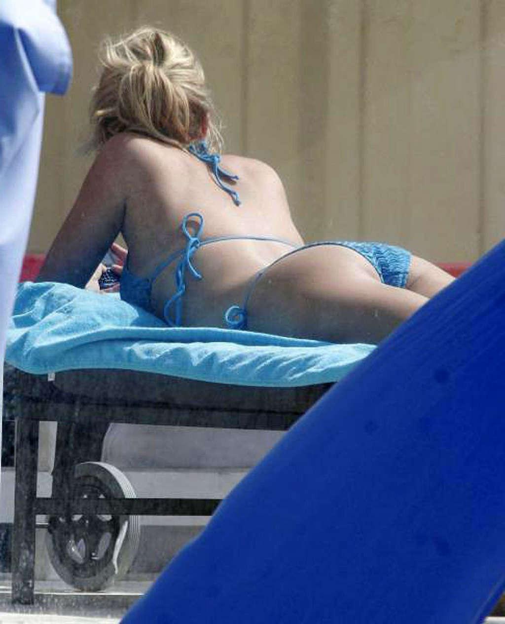 16P Kristin Cavallari exposing her sexy body and hot ass in bikini on pool