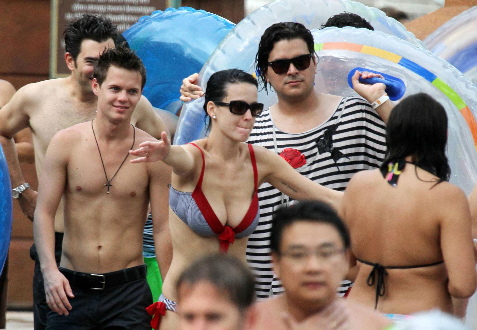 16P Katy Perry exposing her sexy body and huge boobs in bikini on beach