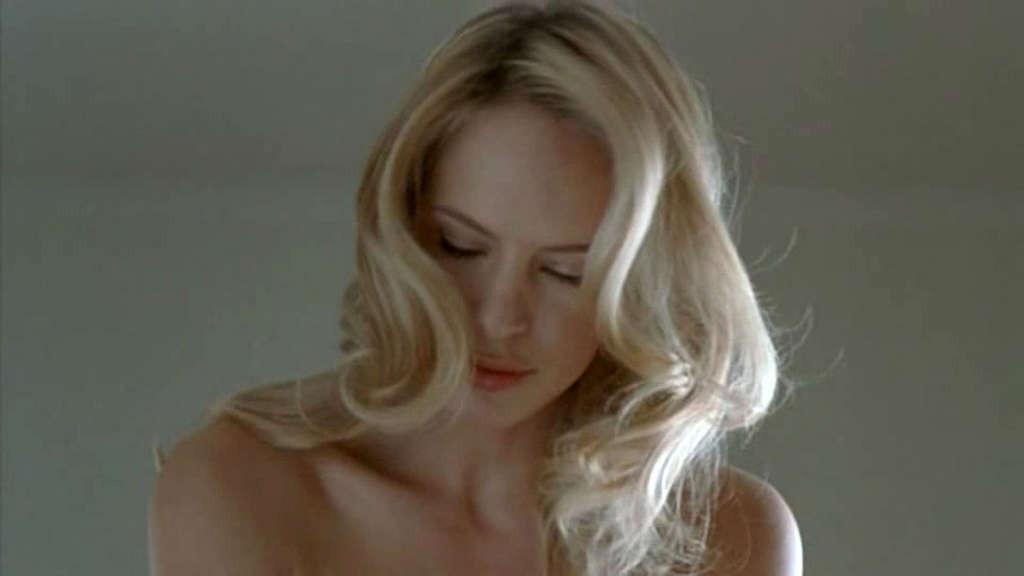 10P Camilla Sjoberg exposing her huge tits and great ass in red thong in nude movie 