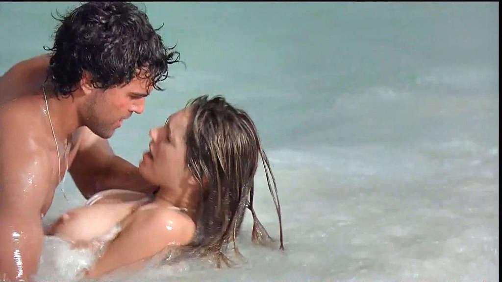 10P Kelly Brook exposing her nice big tits and great ass on beach in movie