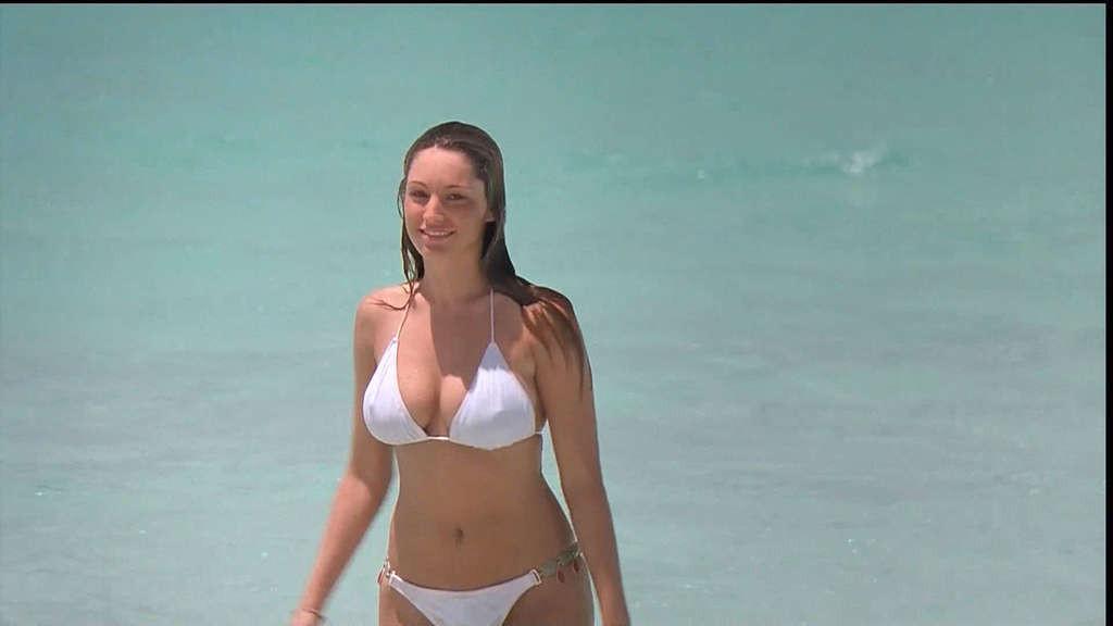 10P Kelly Brook exposing her nice big tits and great ass on beach in movie