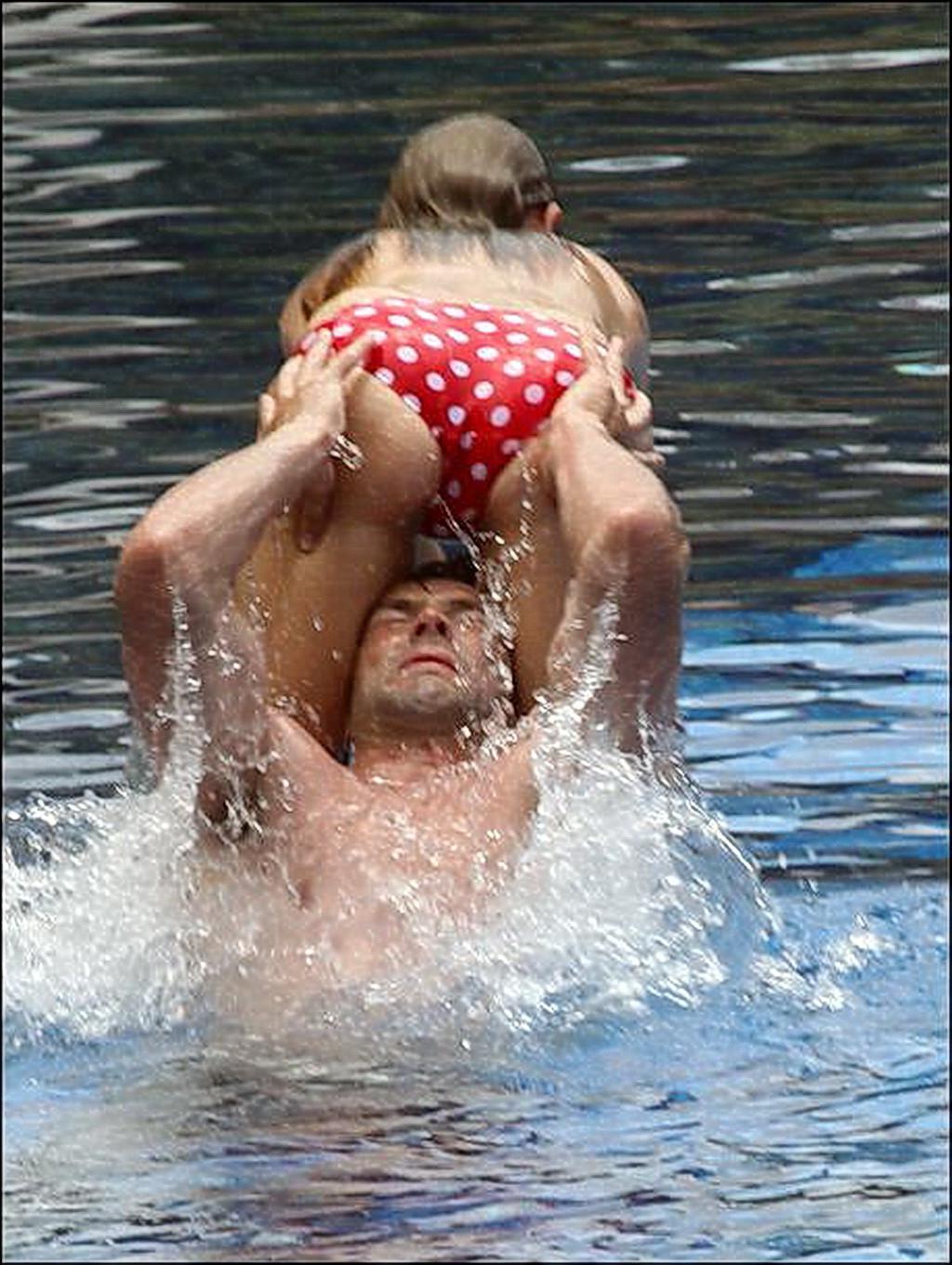 16P Una Healy topless in the pool in Ibiza dominated by her horny boyfriend