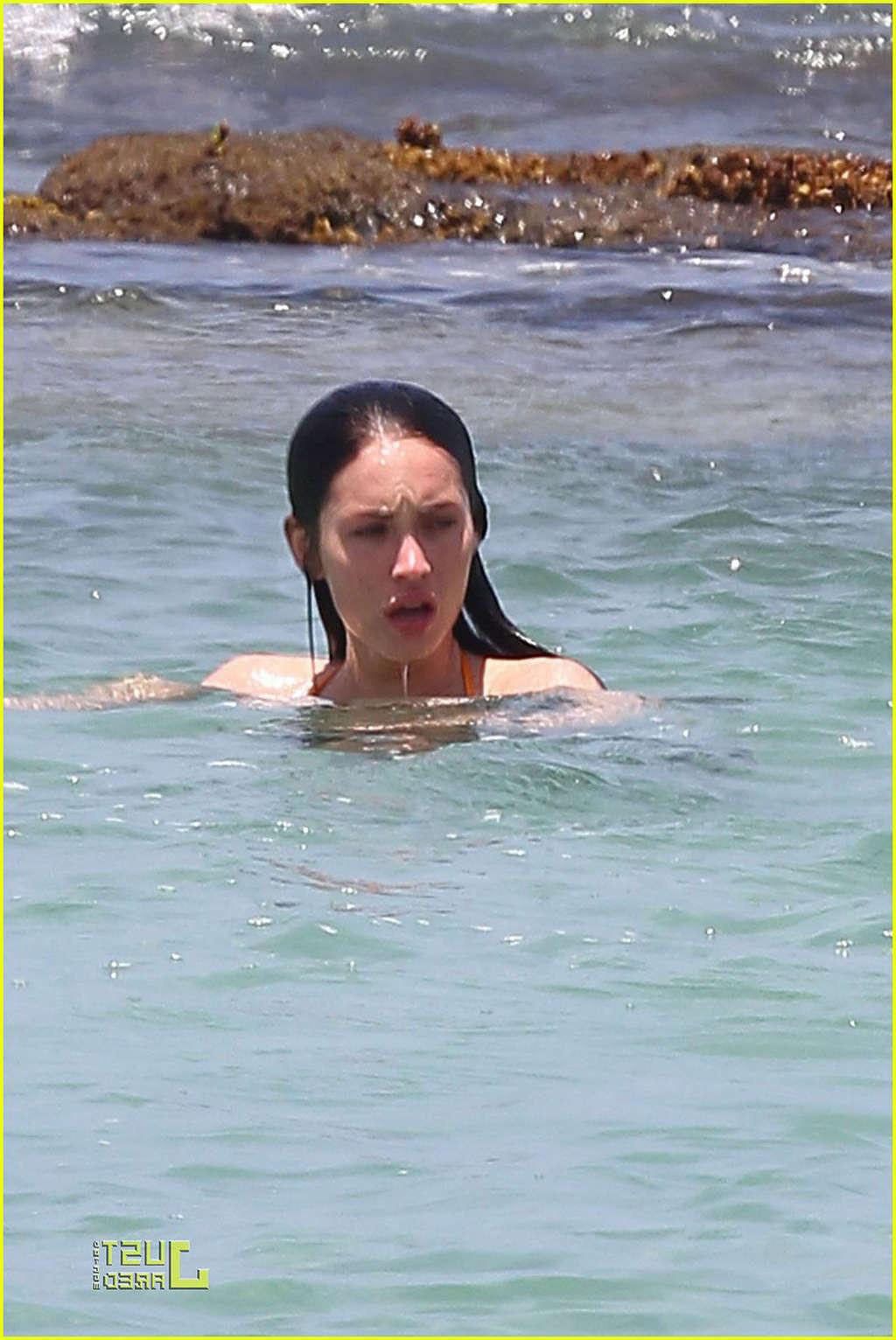 16P Megan Fox in bikini playing on beach with her boyfriend