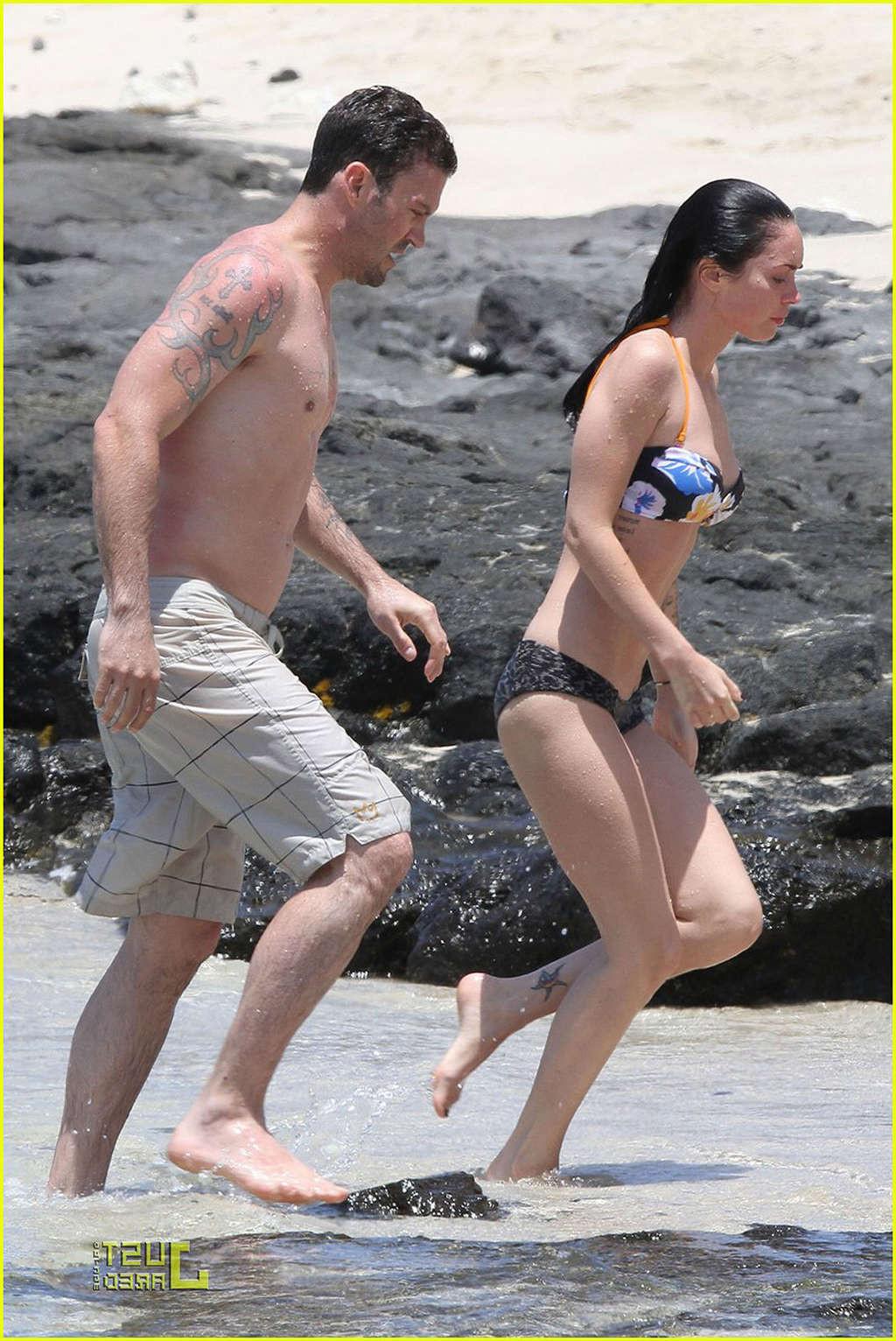 16P Megan Fox in bikini playing on beach with her boyfriend