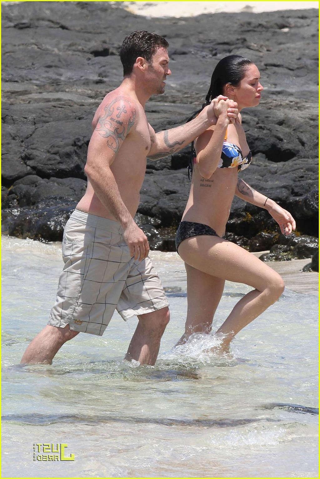 16P Megan Fox in bikini playing on beach with her boyfriend