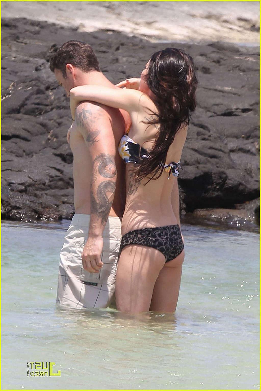 16P Megan Fox in bikini playing on beach with her boyfriend