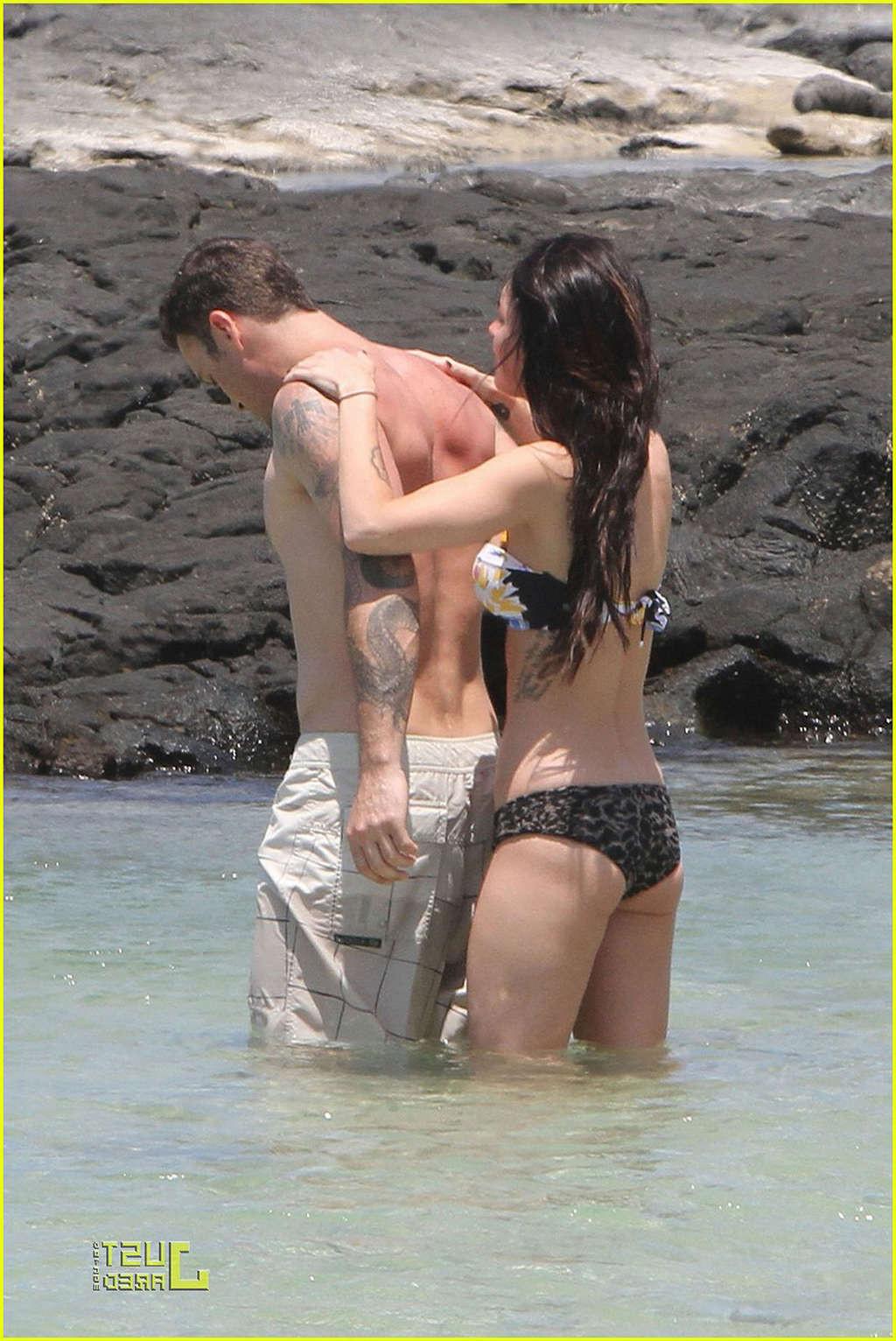 16P Megan Fox in bikini playing on beach with her boyfriend