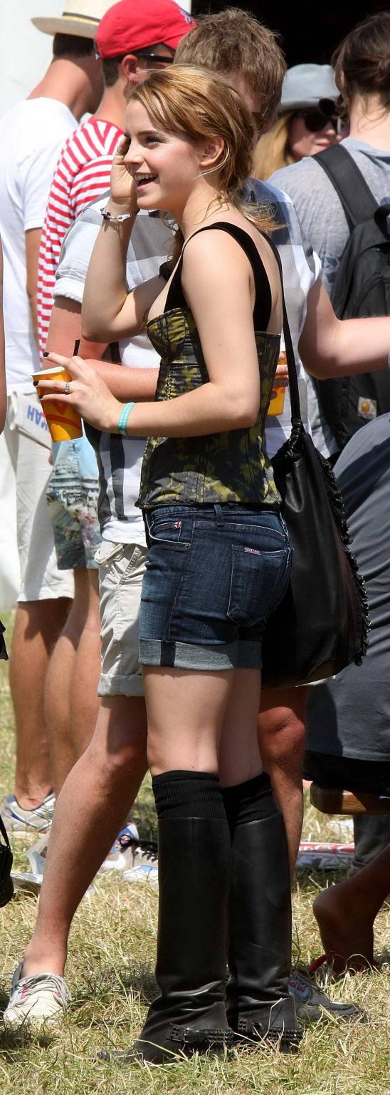 16P Emma Watson leggy  cleavy wearing low cut top, shorts  bots at Glastonbury Music