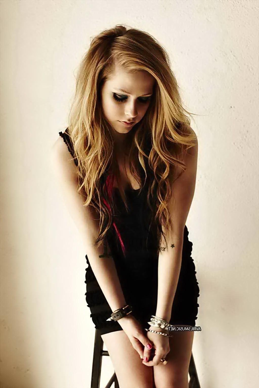 16P Avril Lavigne looking very sexy in mini dress for Inked Magazine photoshoot