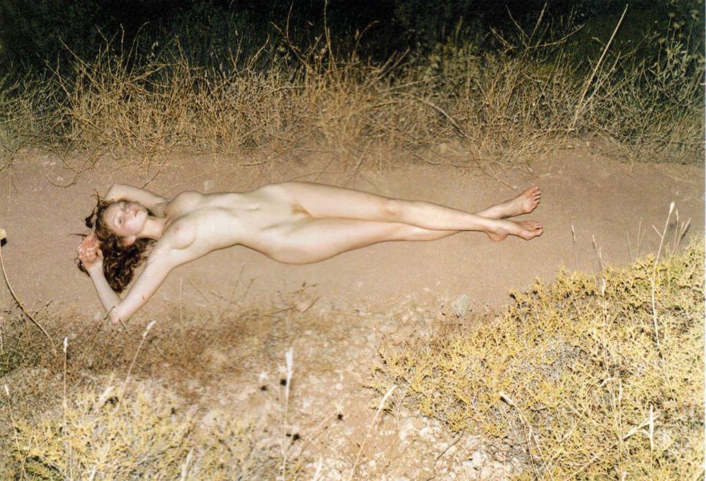 10P Lily Cole reveals her nice small tits and hairy pussy in photoshoot