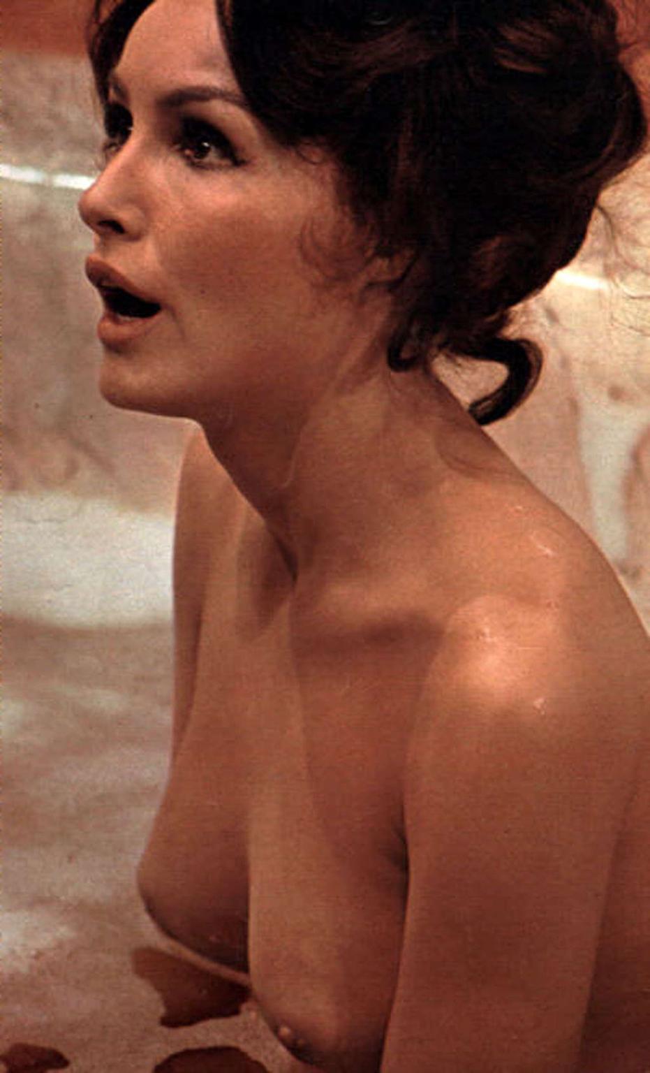 16P Julie Newmar exposing her nice big tits and great ass
