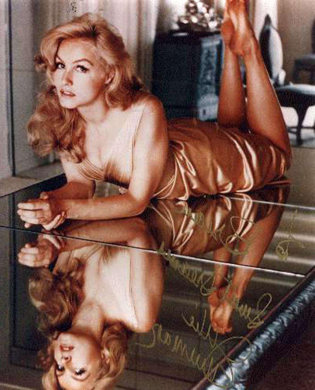 16P Julie Newmar exposing her nice big tits and great ass