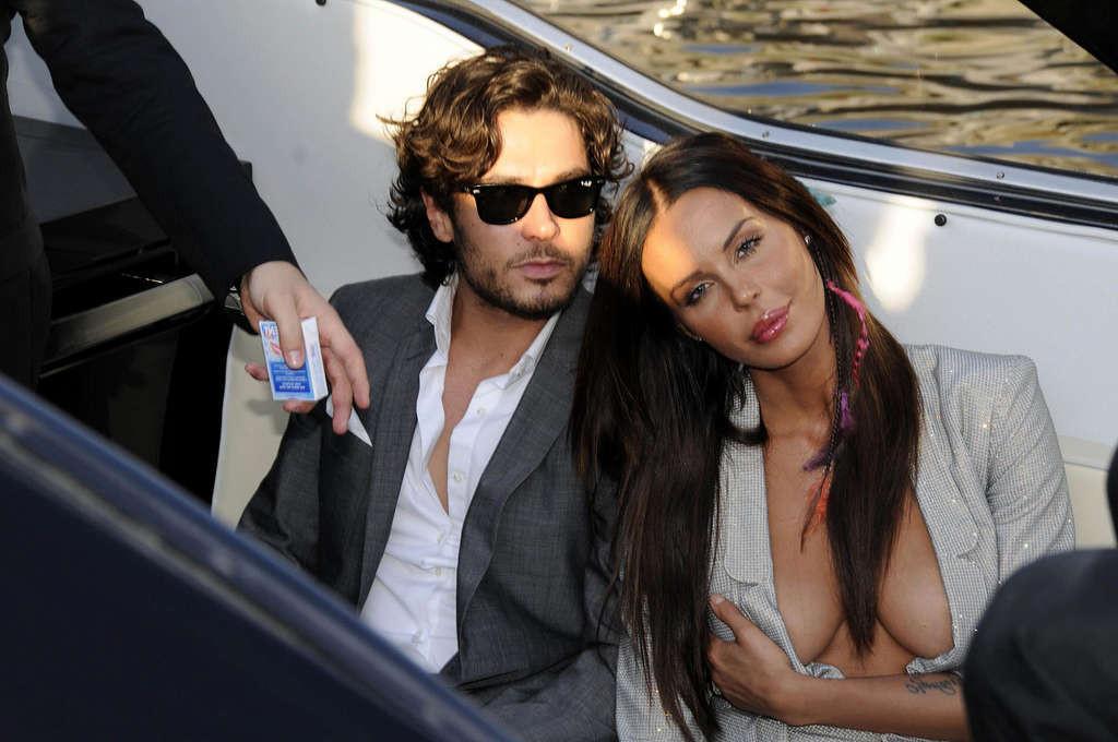 10P Nina Moric exposing her nice big tits and great ass in photoshoot