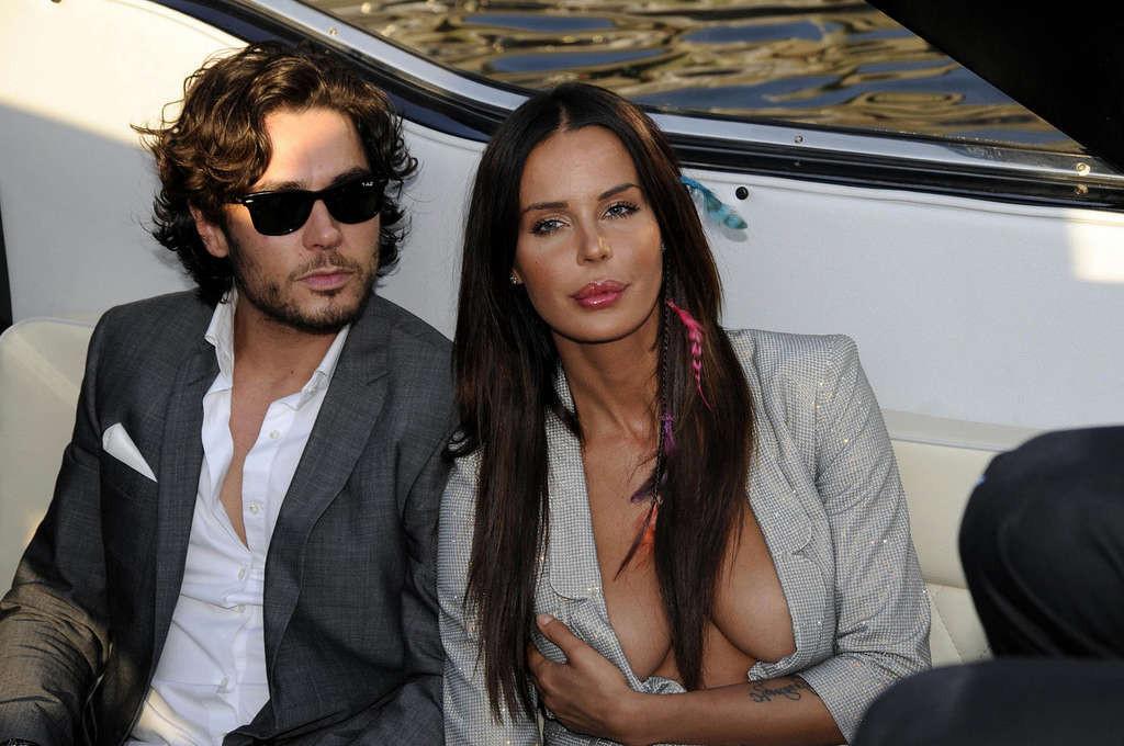 10P Nina Moric exposing her nice big tits and great ass in photoshoot