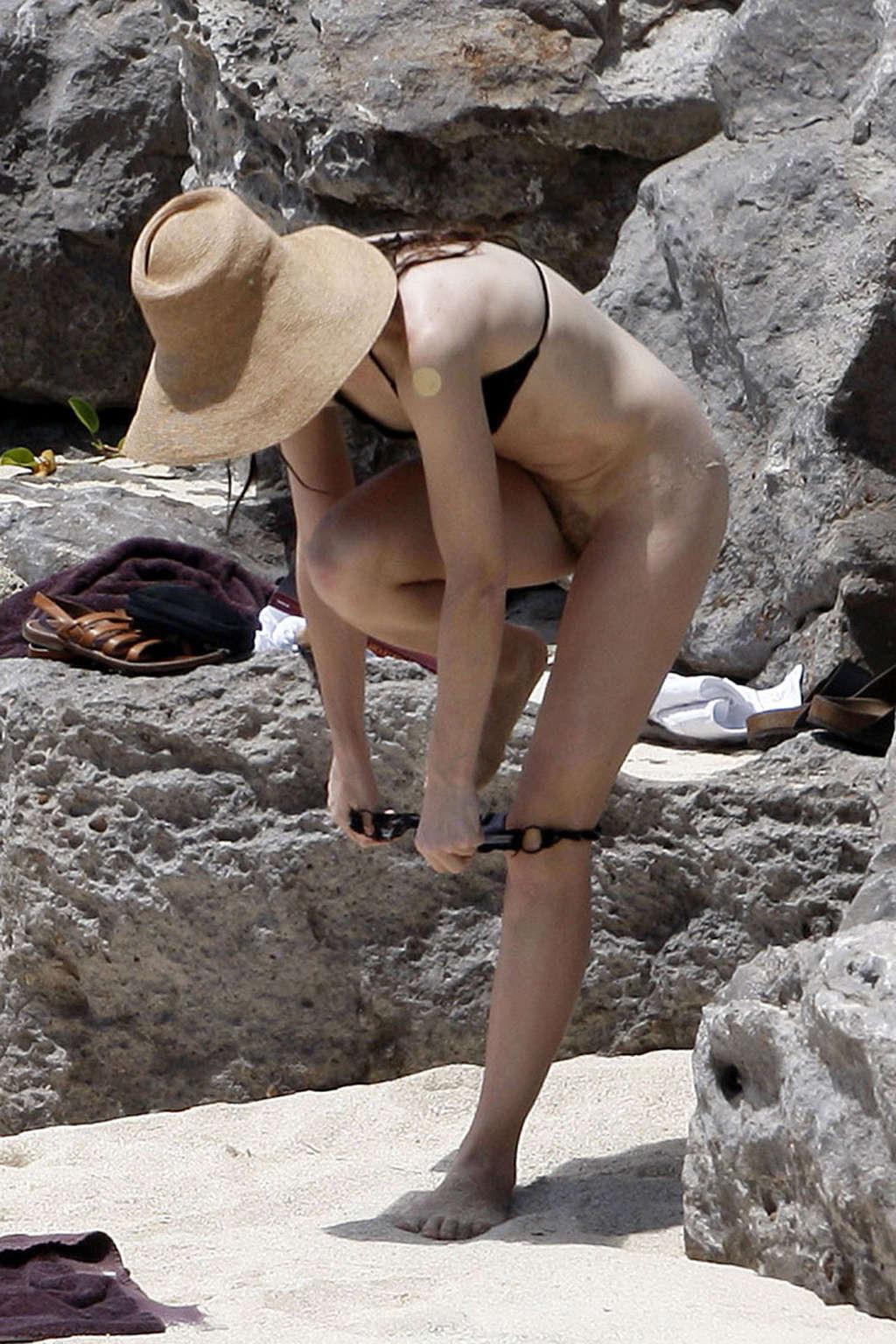 10P Charlotte Gainsbourg exposing her nice tits and pussy on beach