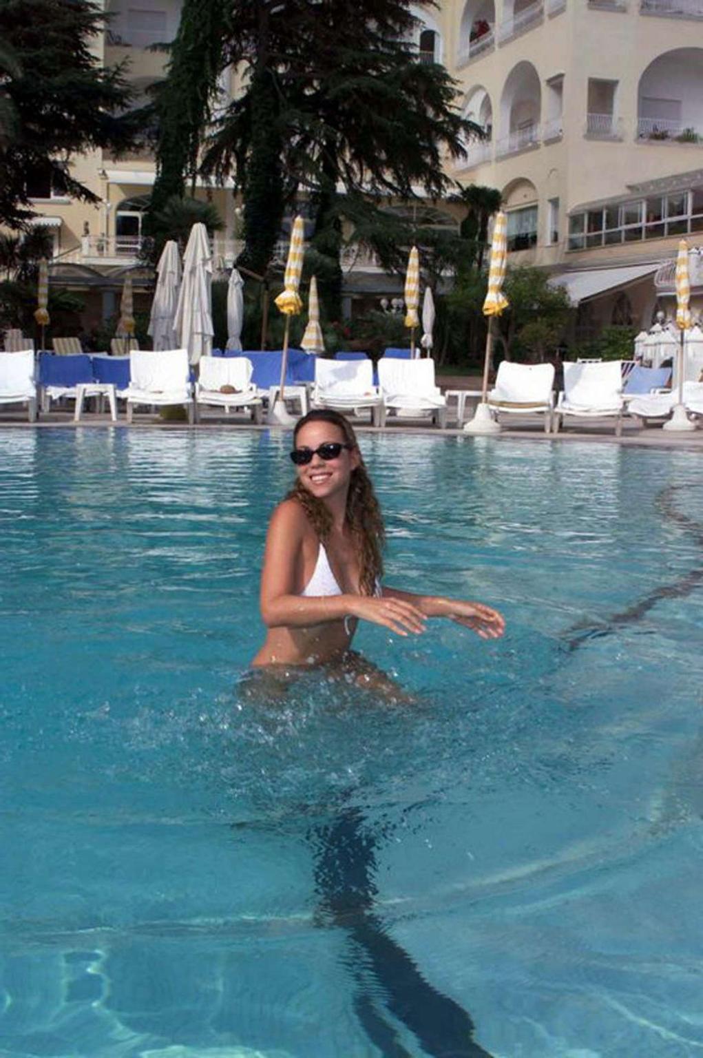 16P Mariah Carey exposing her sexy body and hot ass in bikini on beach