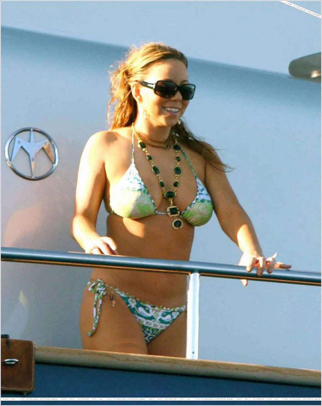 16P Mariah Carey exposing her sexy body and hot ass in bikini on yacht