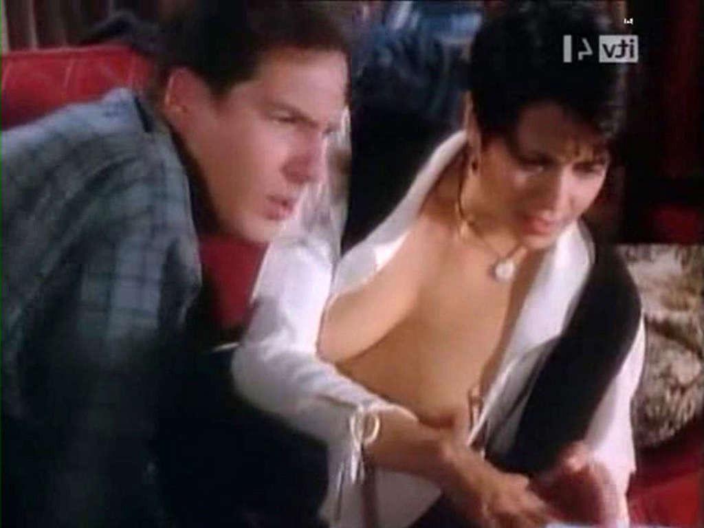 16P Catherine Bell exposing her nice tits and posing in bikini
