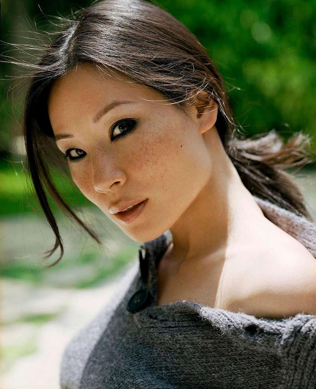 16P Lucy Liu exposing her nice small tits in see thru top