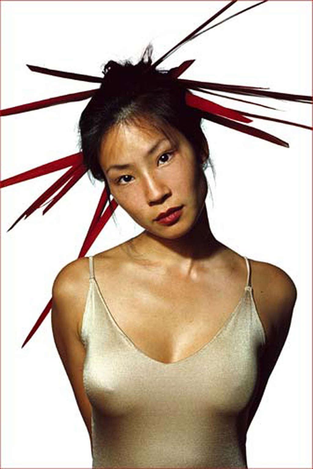 16P Lucy Liu exposing her nice small tits in see thru top
