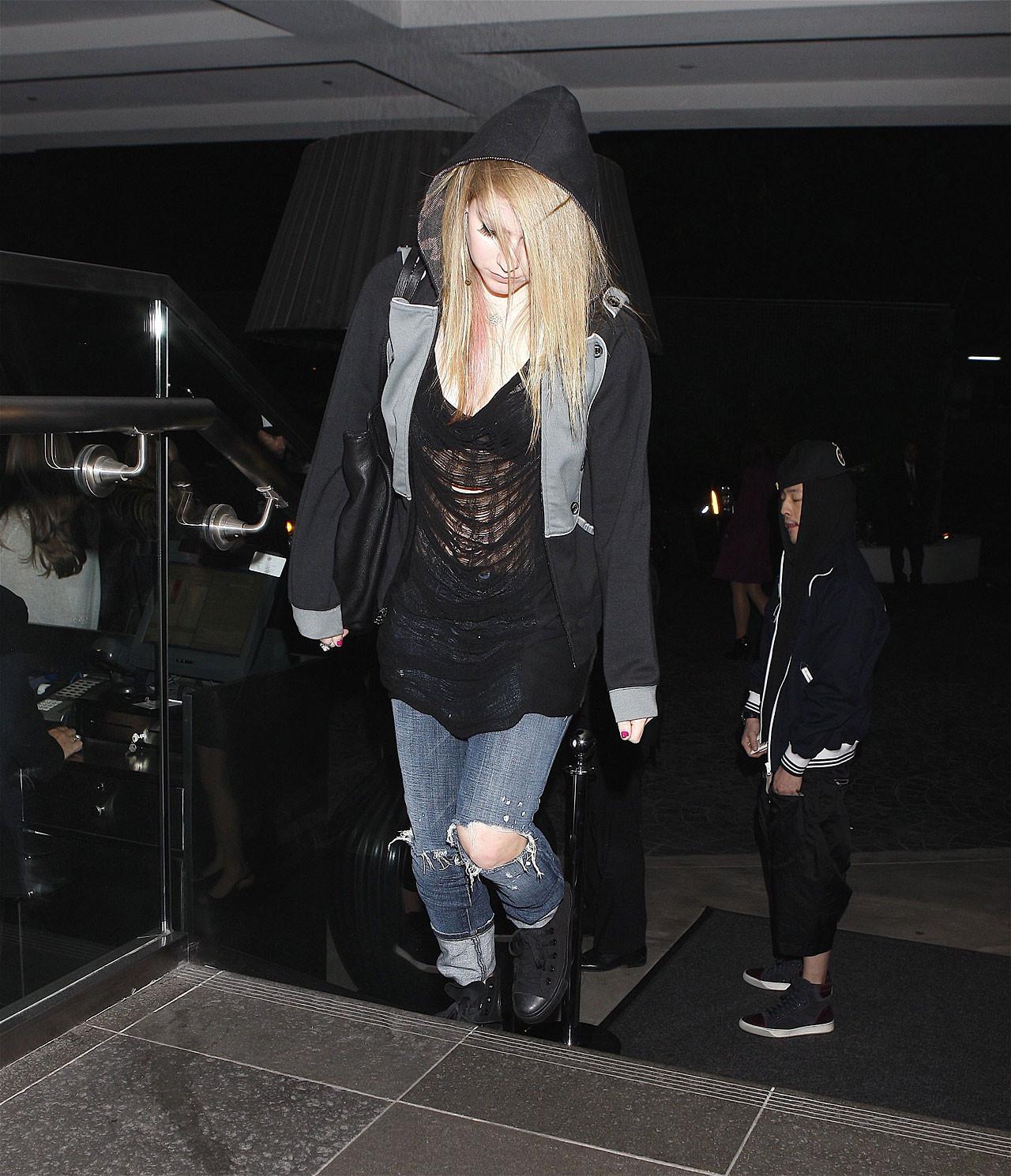 16P Avril Lavigne exposing her sexy body and hot tits in see thru blouse