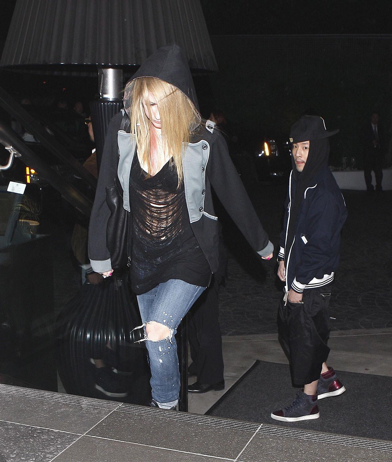 16P Avril Lavigne exposing her sexy body and hot tits in see thru blouse