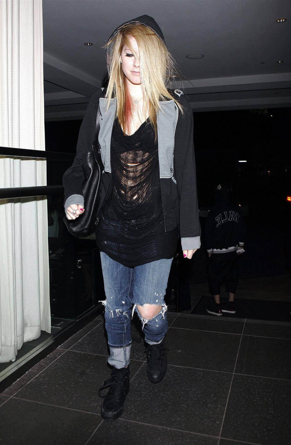 16P Avril Lavigne exposing her sexy body and hot tits in see thru blouse