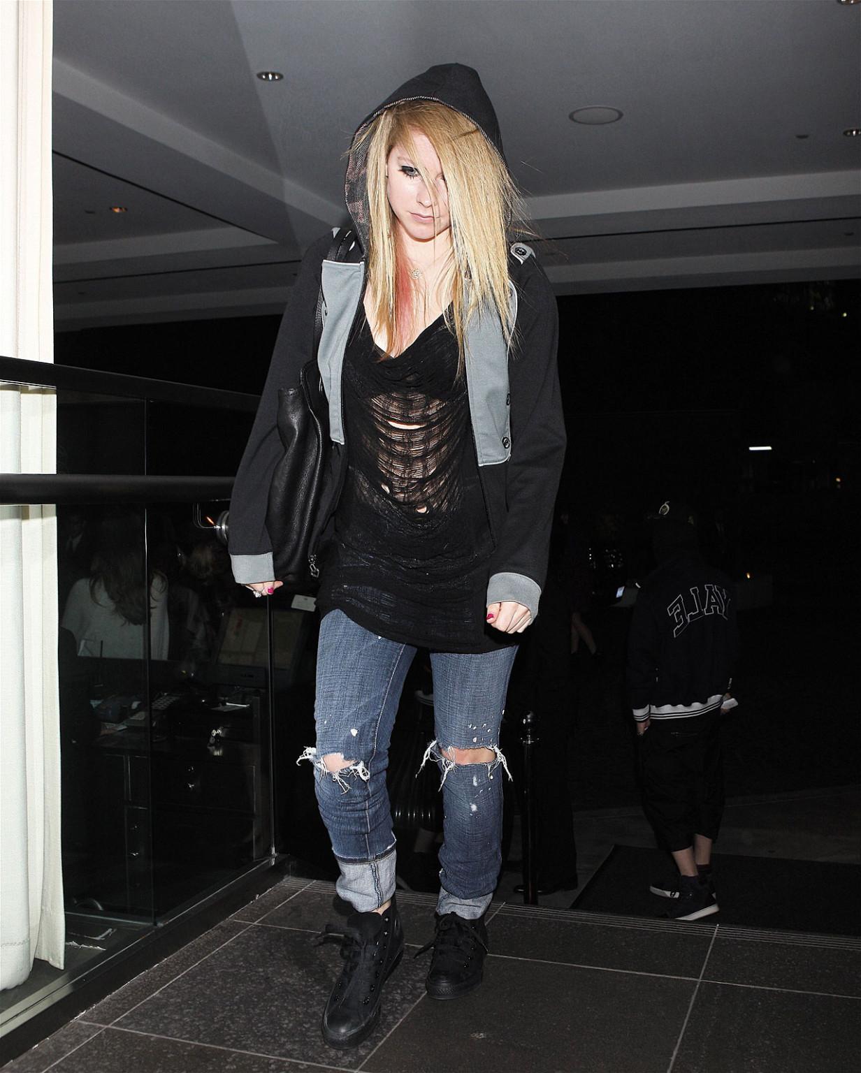 16P Avril Lavigne exposing her sexy body and hot tits in see thru blouse