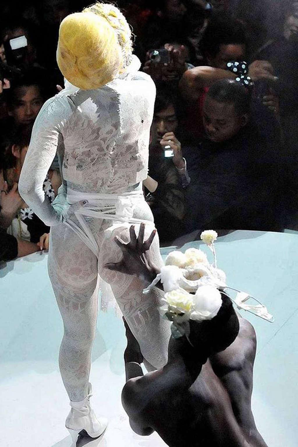 16P Lady GaGa showing her fucking sexy ass in see thru dress on stage