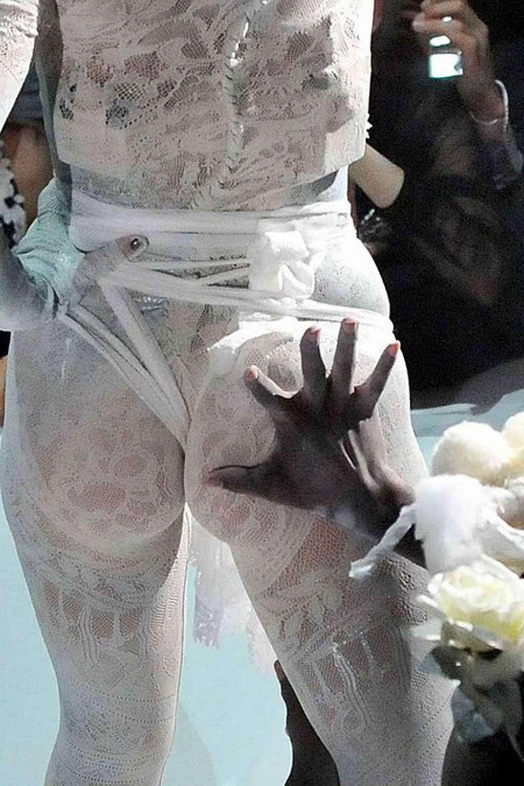 16P Lady GaGa showing her fucking sexy ass in see thru dress on stage