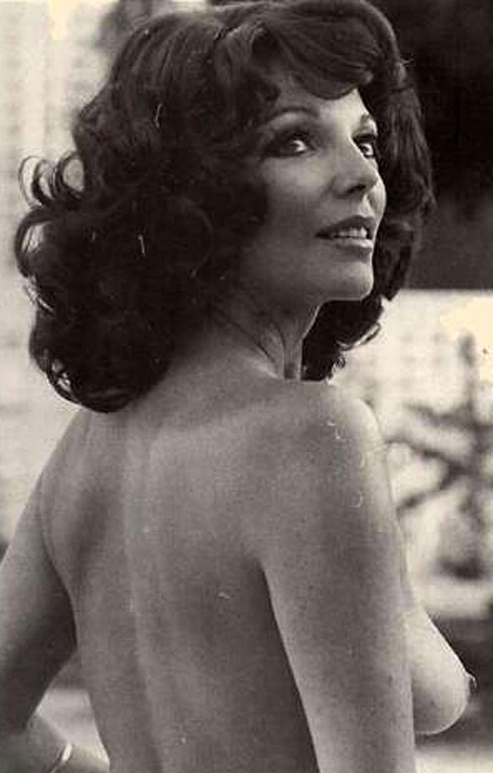 16P Joan Collins exposing her nice big tits in photoshoot