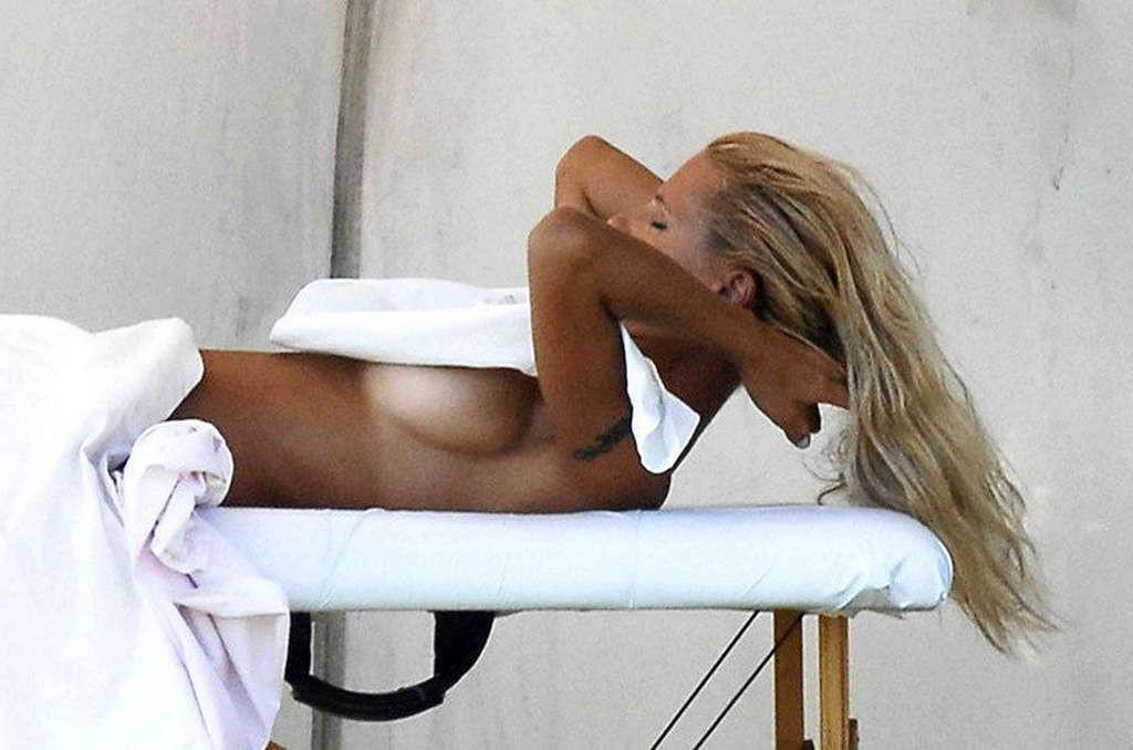 10P Michelle Hunziker showing her nice big tits and ass and posing in lingerie