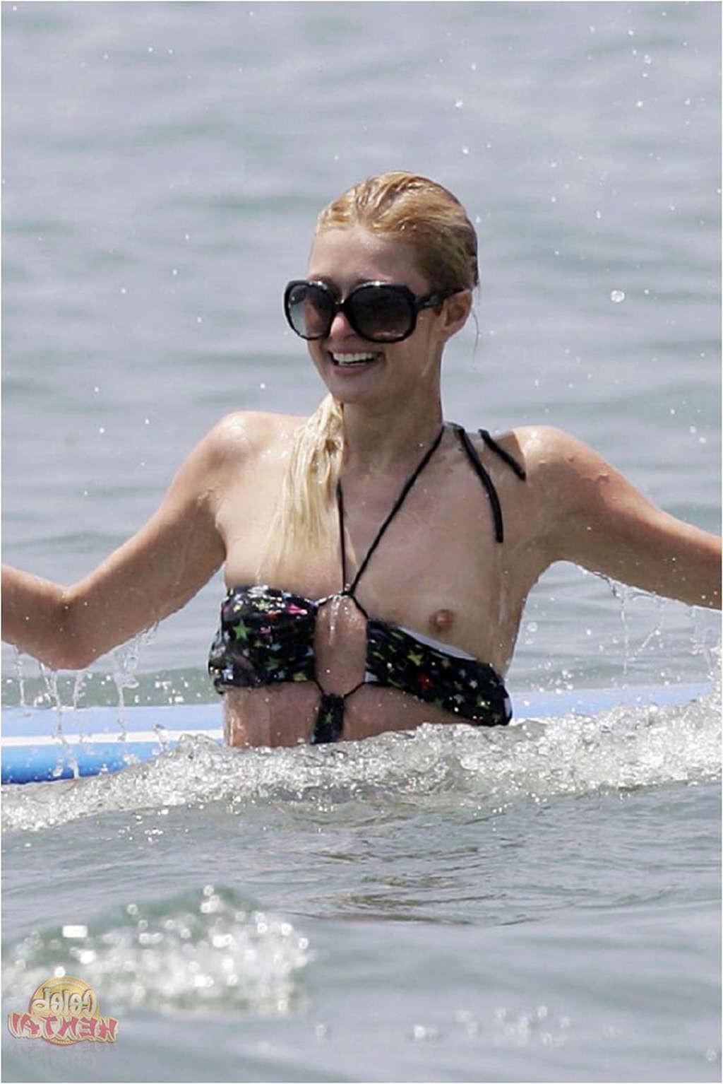 16P Paris Hilton very sexy and hot upskirt nude and nipple slip photos