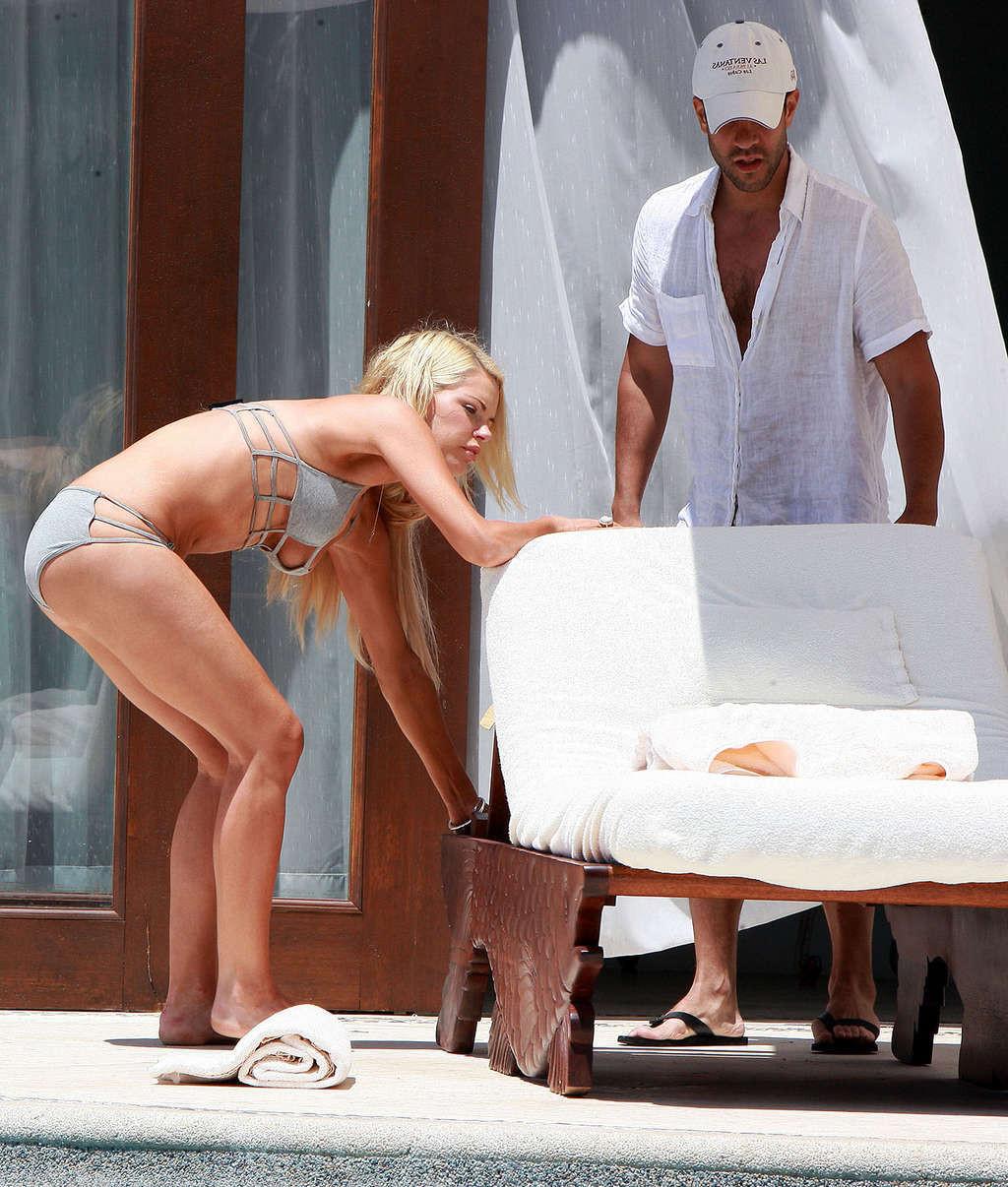 16P Sophie Monk showing her sexy body and huge boobs in bikini