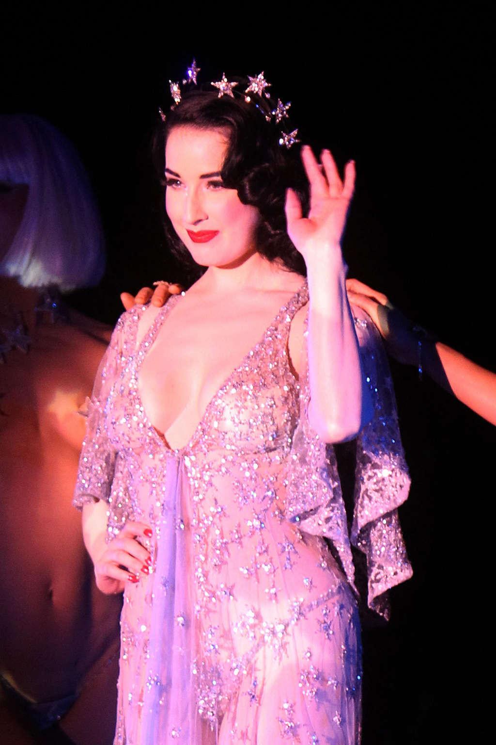 10P Dita Von Teese showing her nice tits and ass in thong on stage