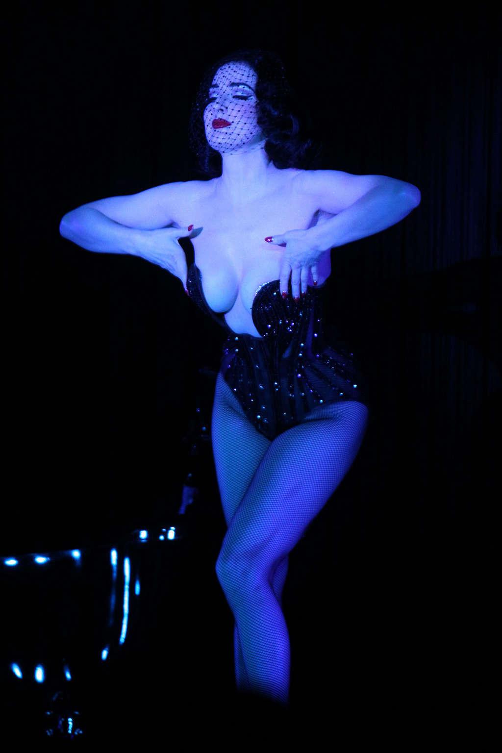 10P Dita Von Teese showing her nice tits and ass in thong on stage