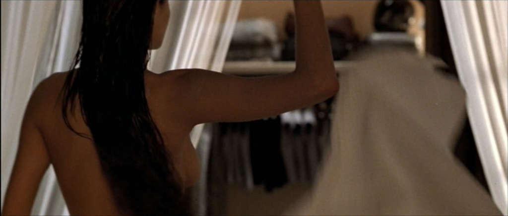 10P Angelina Jolie showing her nice big tits and great ass in nude movie scenes