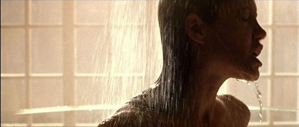 10P Angelina Jolie showing her nice big tits and great ass in nude movie scenes