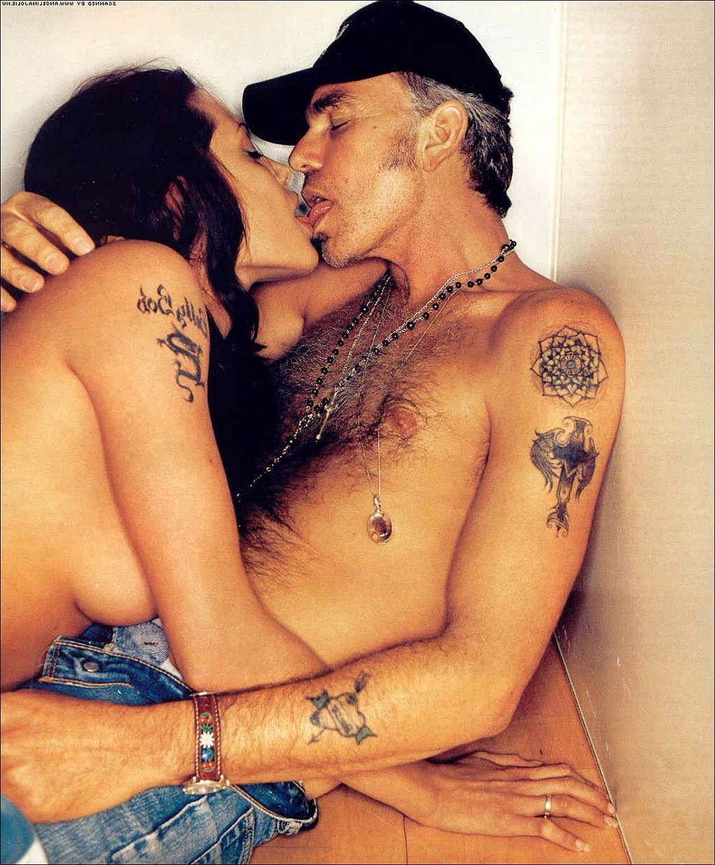 10P Angelina Jolie showing her nice big tits and great ass in nude movie scenes