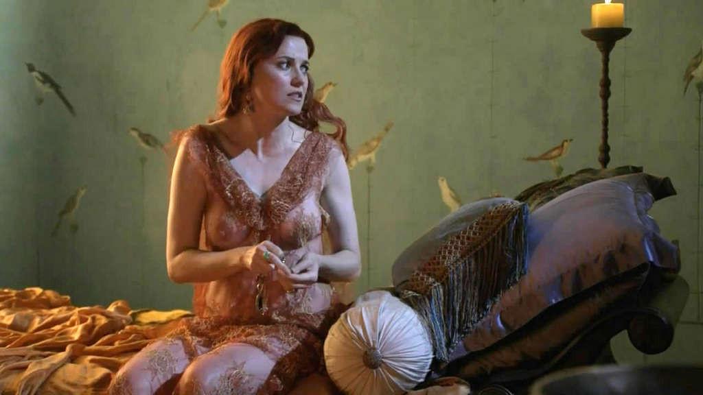 10P Lucy Lawless showing her nice big tits and posing sexy in latex suit