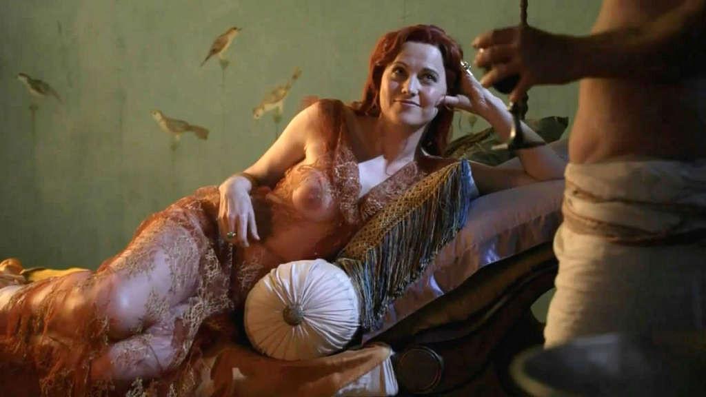 10P Lucy Lawless showing her nice big tits and posing sexy in latex suit