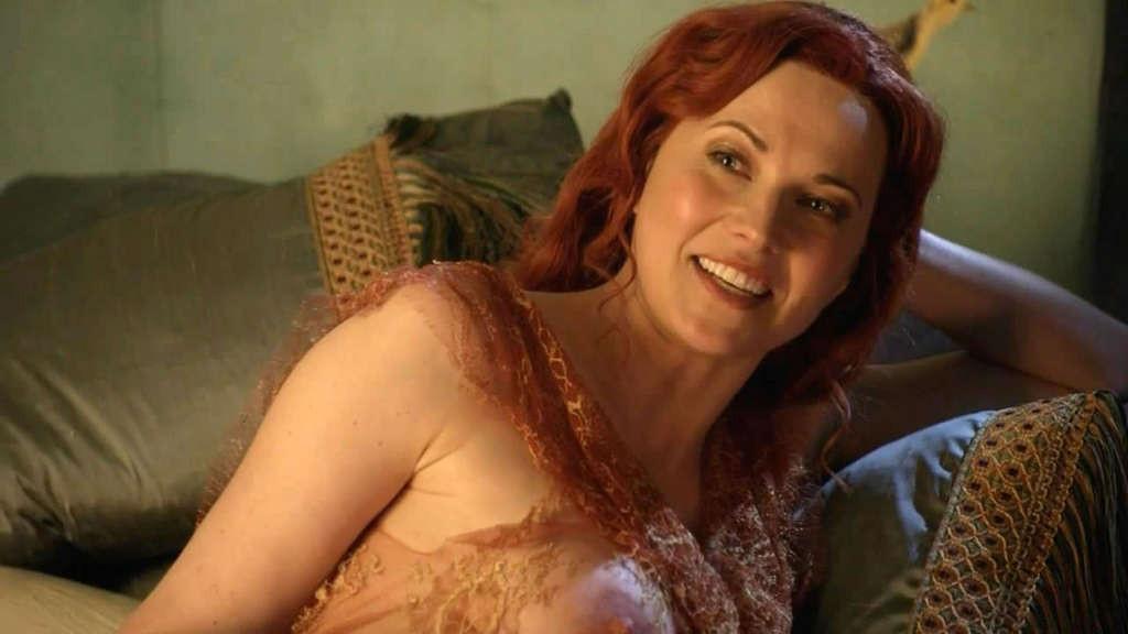 10P Lucy Lawless showing her nice big tits and posing sexy in latex suit