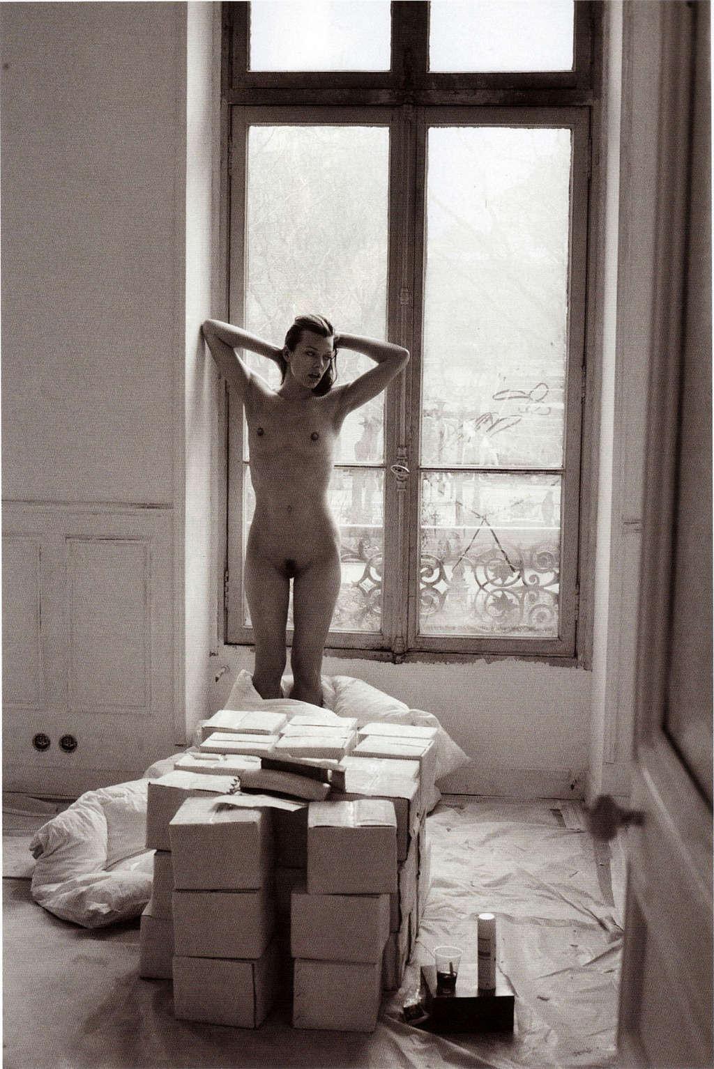 10P Milla Jovovich showing her nice small tits and hairy pussy