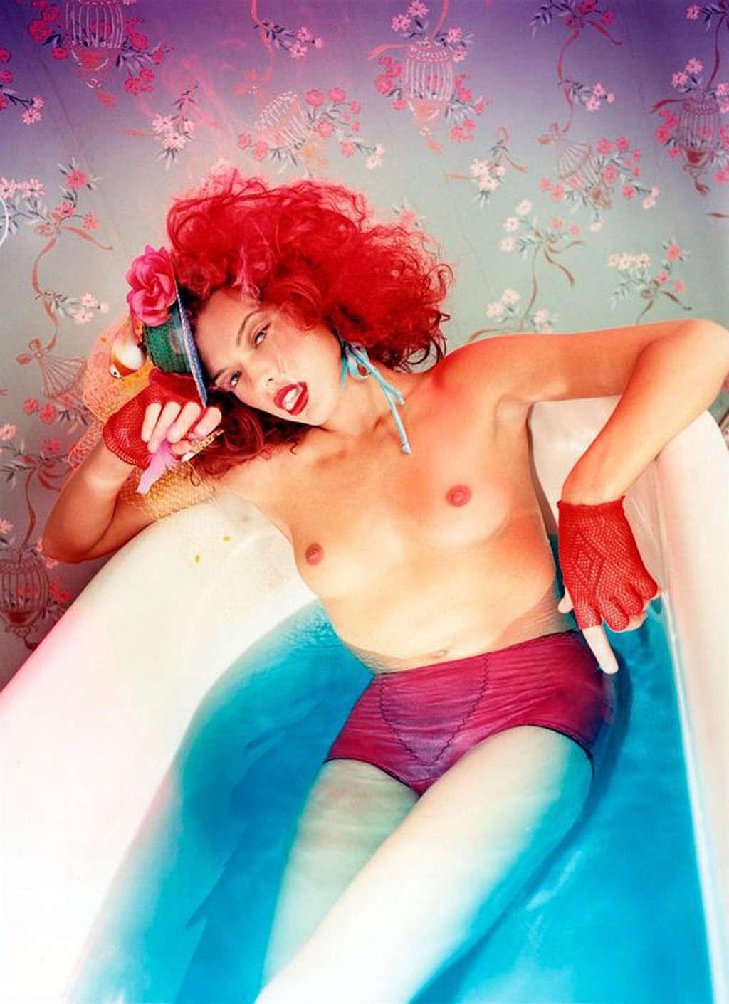 10P Milla Jovovich showing her nice small tits and hairy pussy
