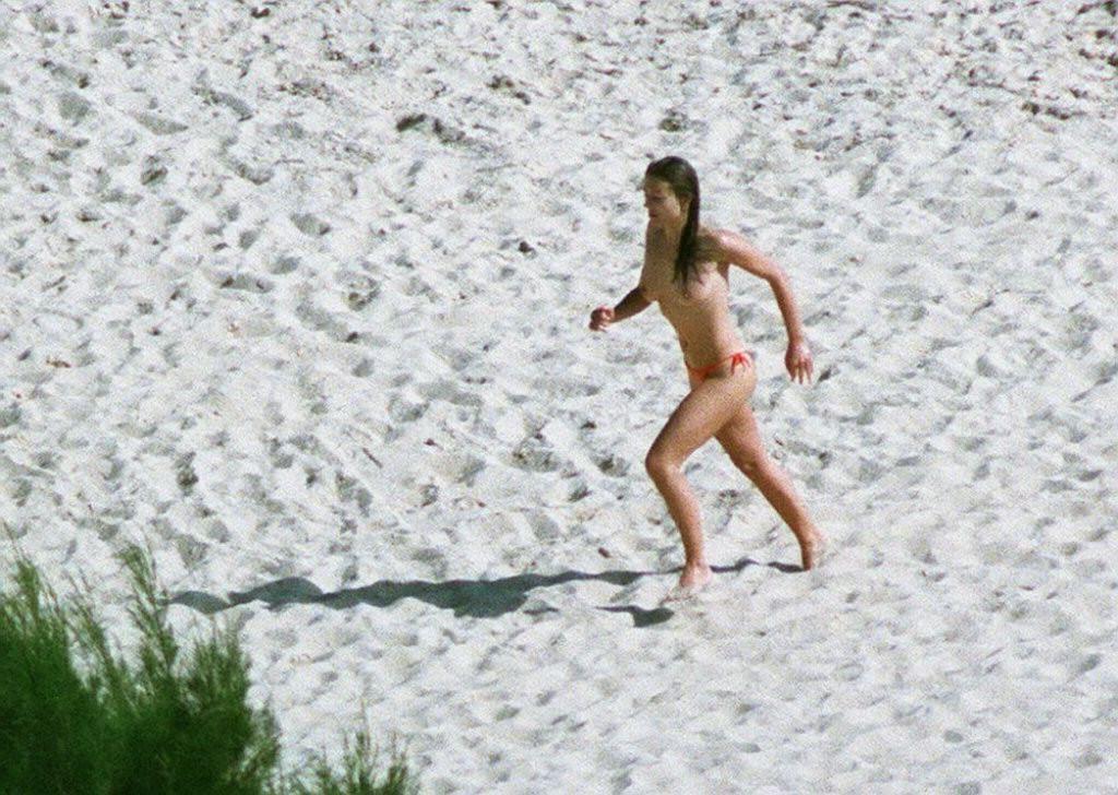 16P Liz Hurley nude big boobs at a public beach