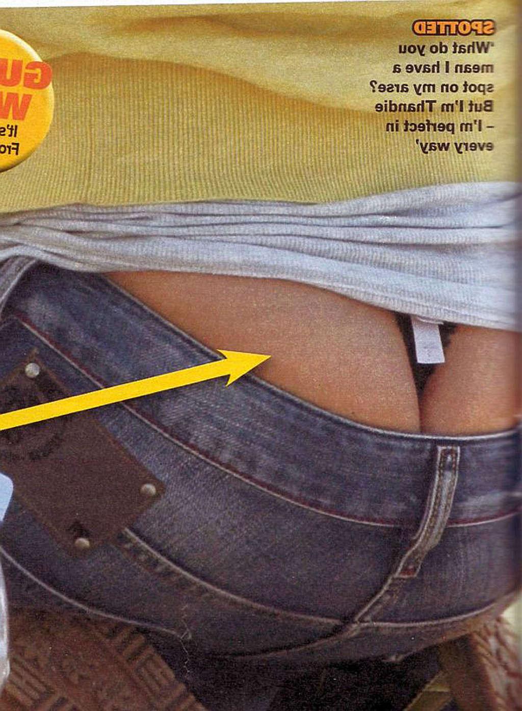 16P Thandie Newton showing her tits and thong slip paparazzi shoots