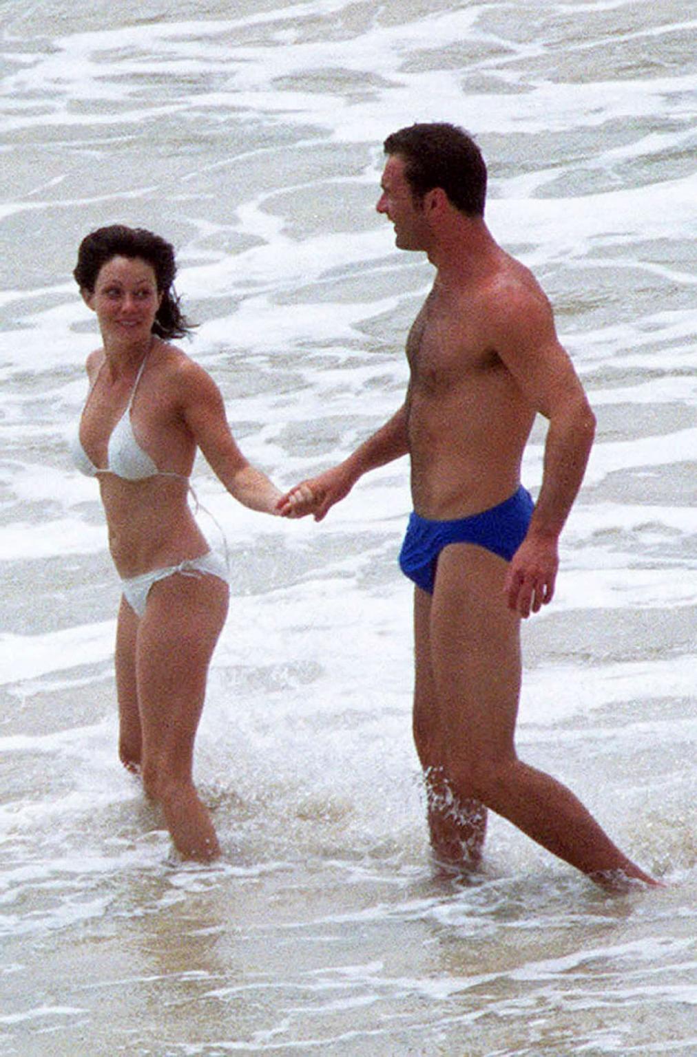 10P Shannen Doherty exposing her nice big tits on beach paparazzi pictures and in se