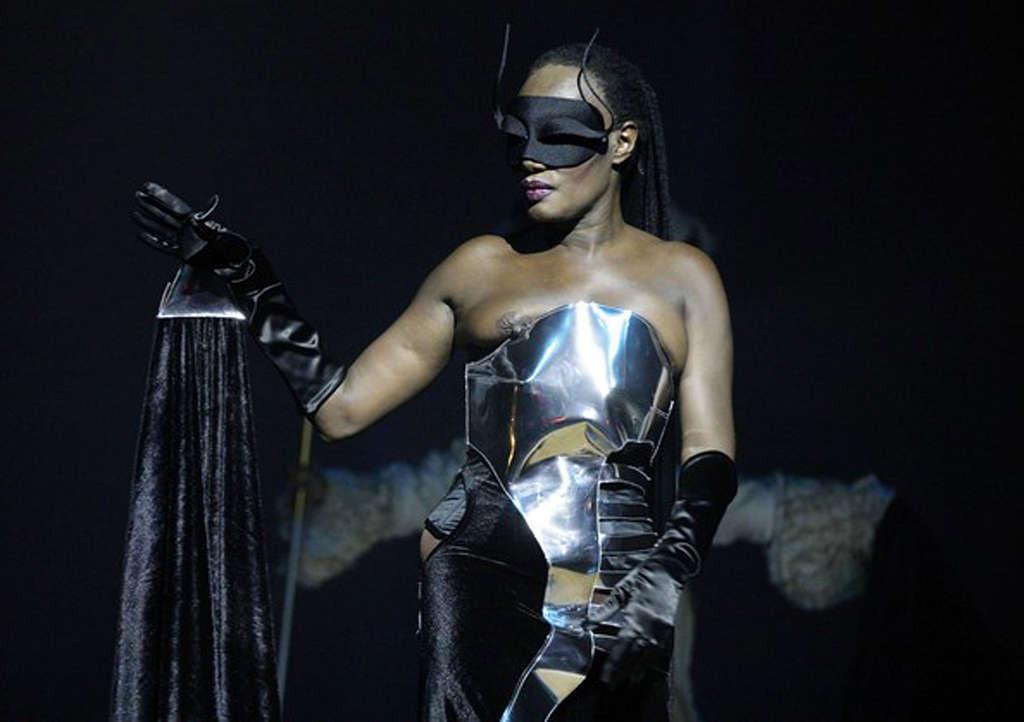 16P Grace Jones tits slip and upskirt on stage paparazzi pictures