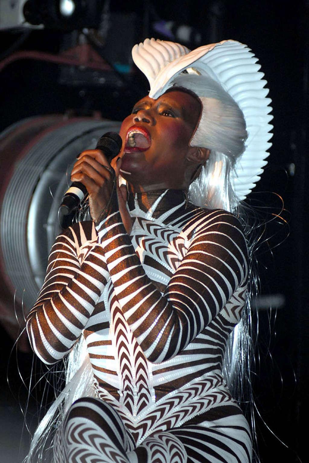 16P Grace Jones tits slip and upskirt on stage paparazzi pictures